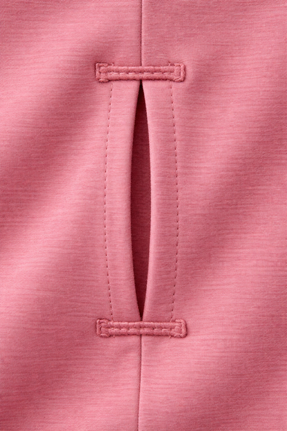 Close-up of a pink fabric with button details