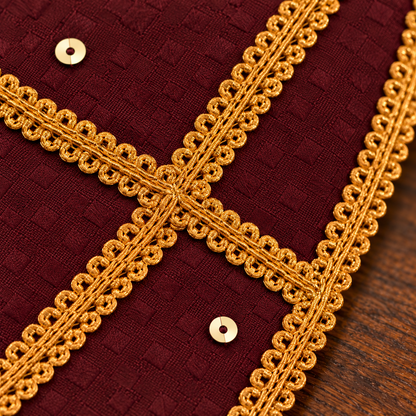 Close-up of gold braid detailing on FurJeevan’s Maroon & Gold Ethnic Dog Bandana, showing the intersecting trims and maroon jacquard weave.