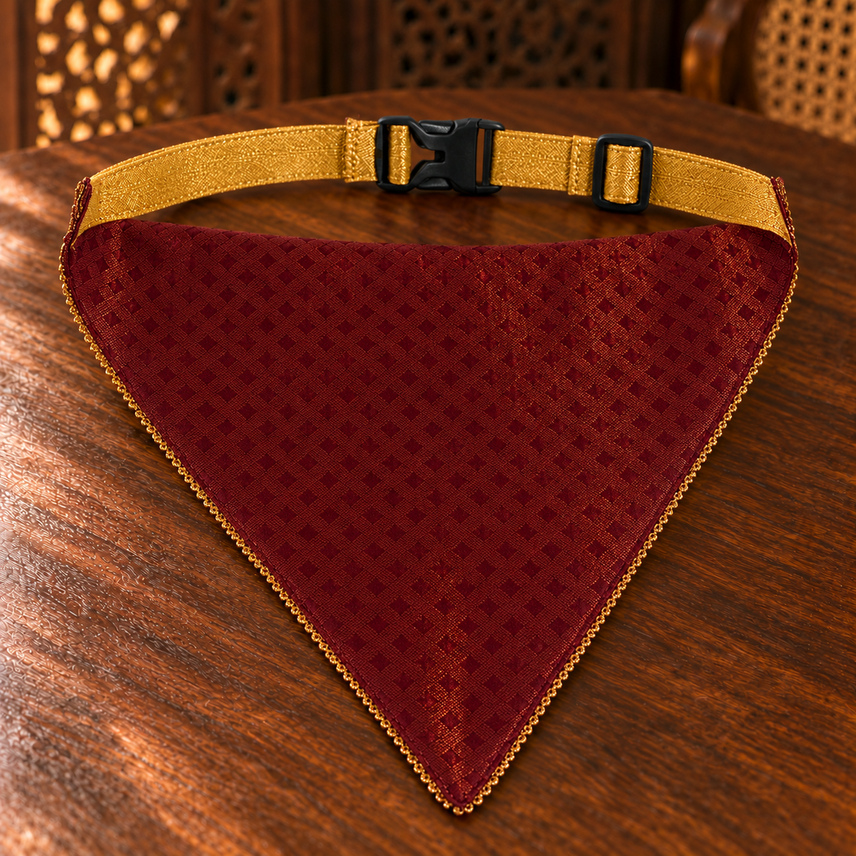 Reverse view of FurJeevan’s Maroon & Gold Ethnic Dog Bandana, showing maroon patterned fabric, gold neck strap and black side-release buckle.